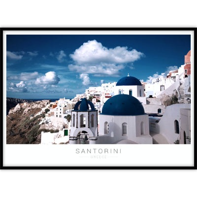 Ingelijste poster met een vergezicht van blauwe daken op het Griekse eiland Santorini.